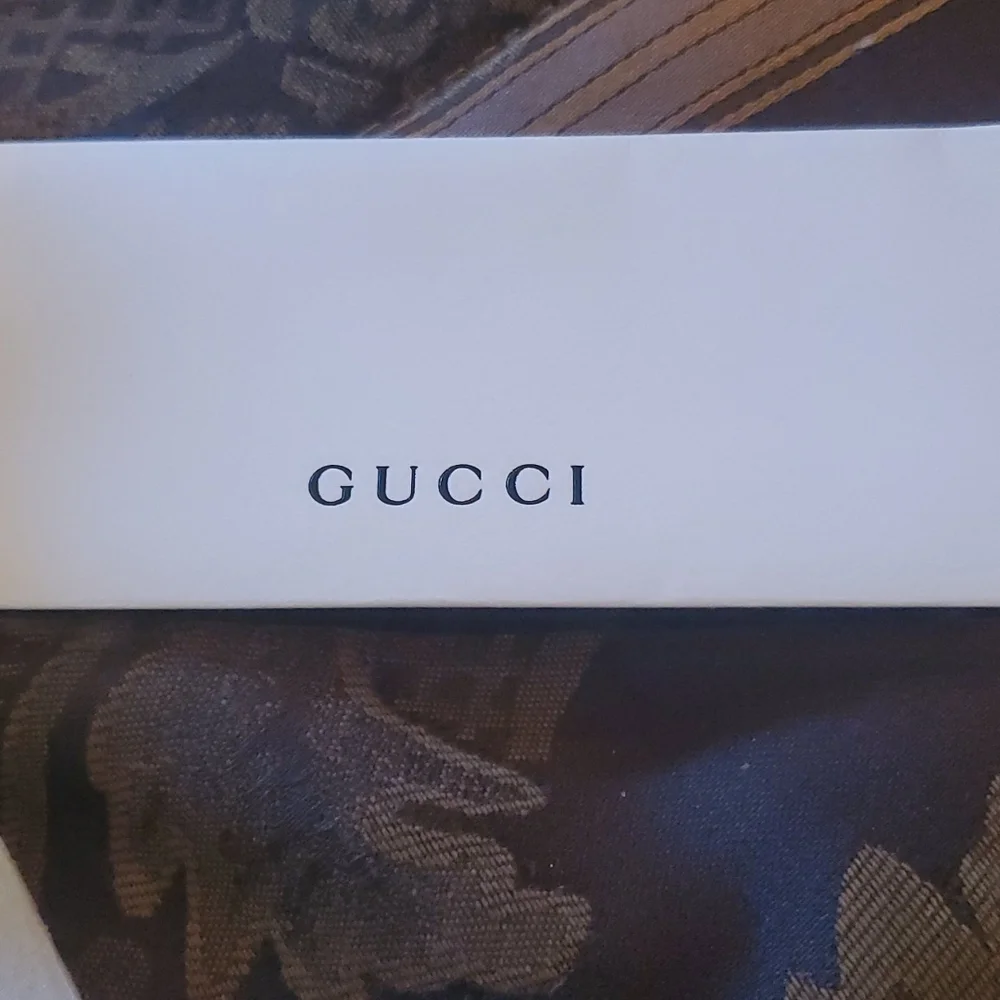 Gucci sunglasses  Hp new bagged tagged warranty includes all case gorgeous suede